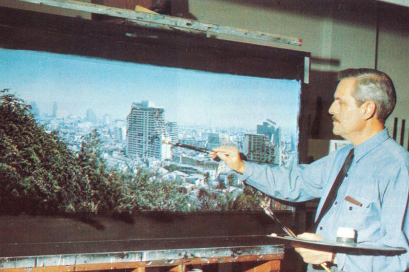 Albert Whitlock painting a scene