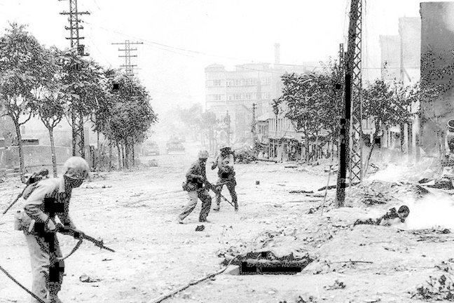 U.S. Marines engaged in urban warfare during the battle for Seoul in late September 1950.