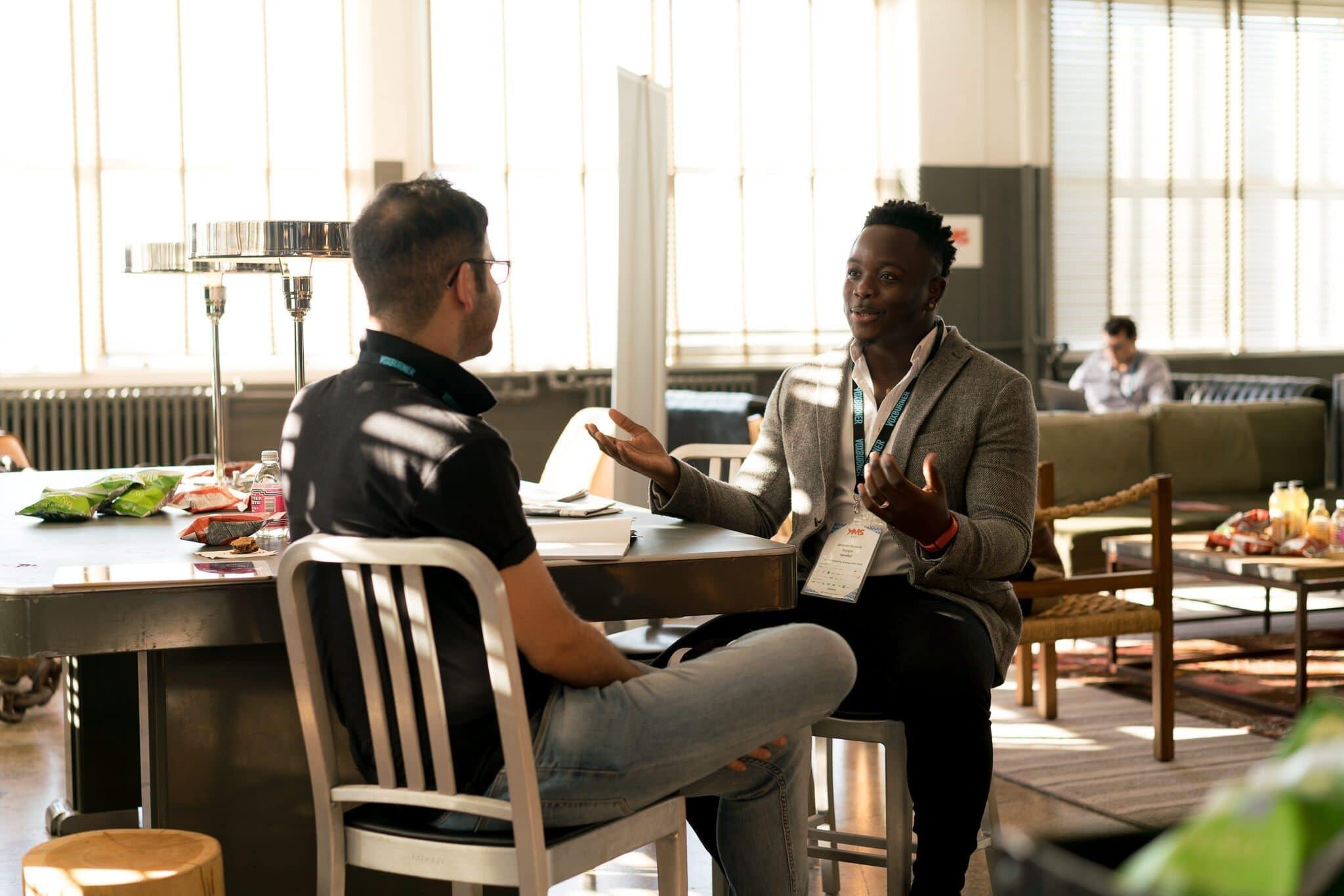 two men in conversation