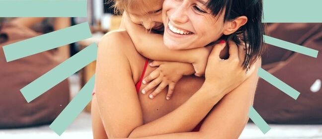 Woman and young girl hugging