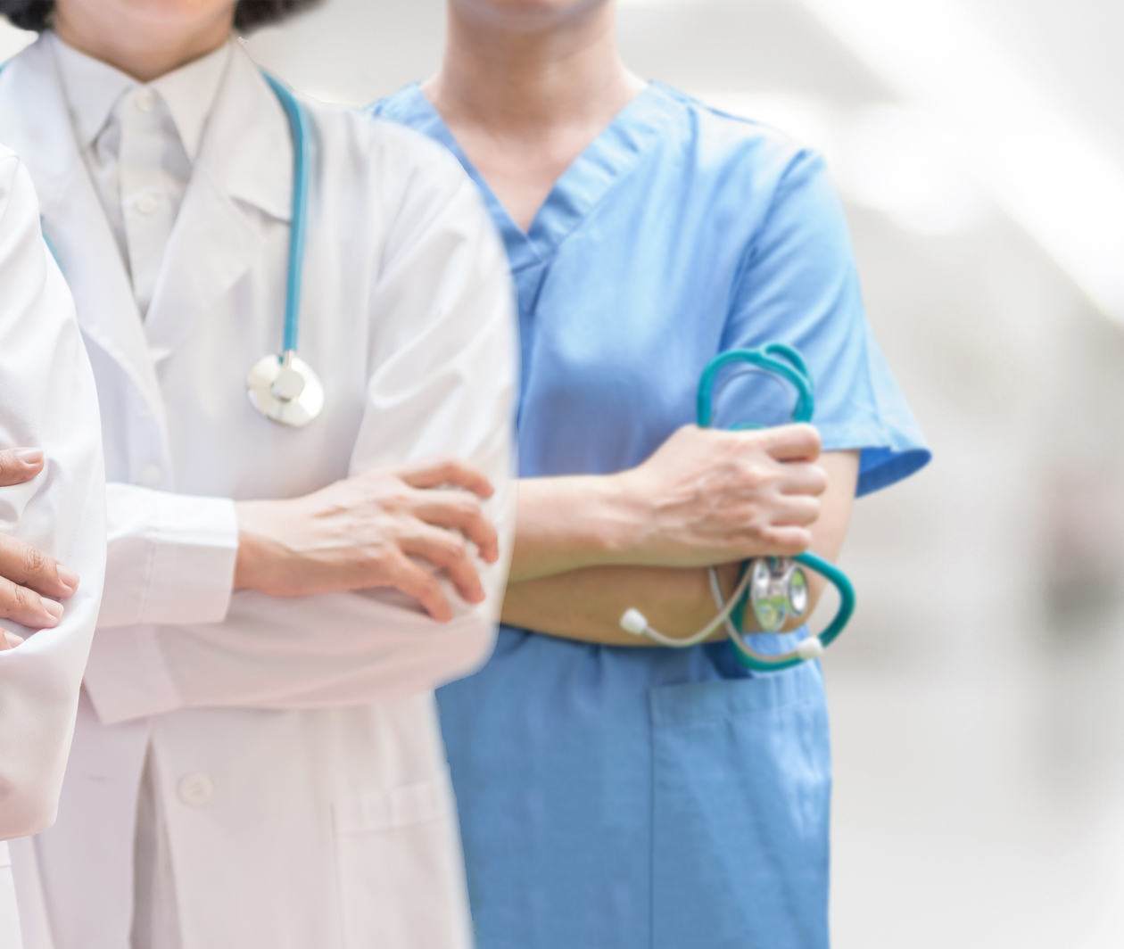 Doctor and surgeon professional team with medical clinic background