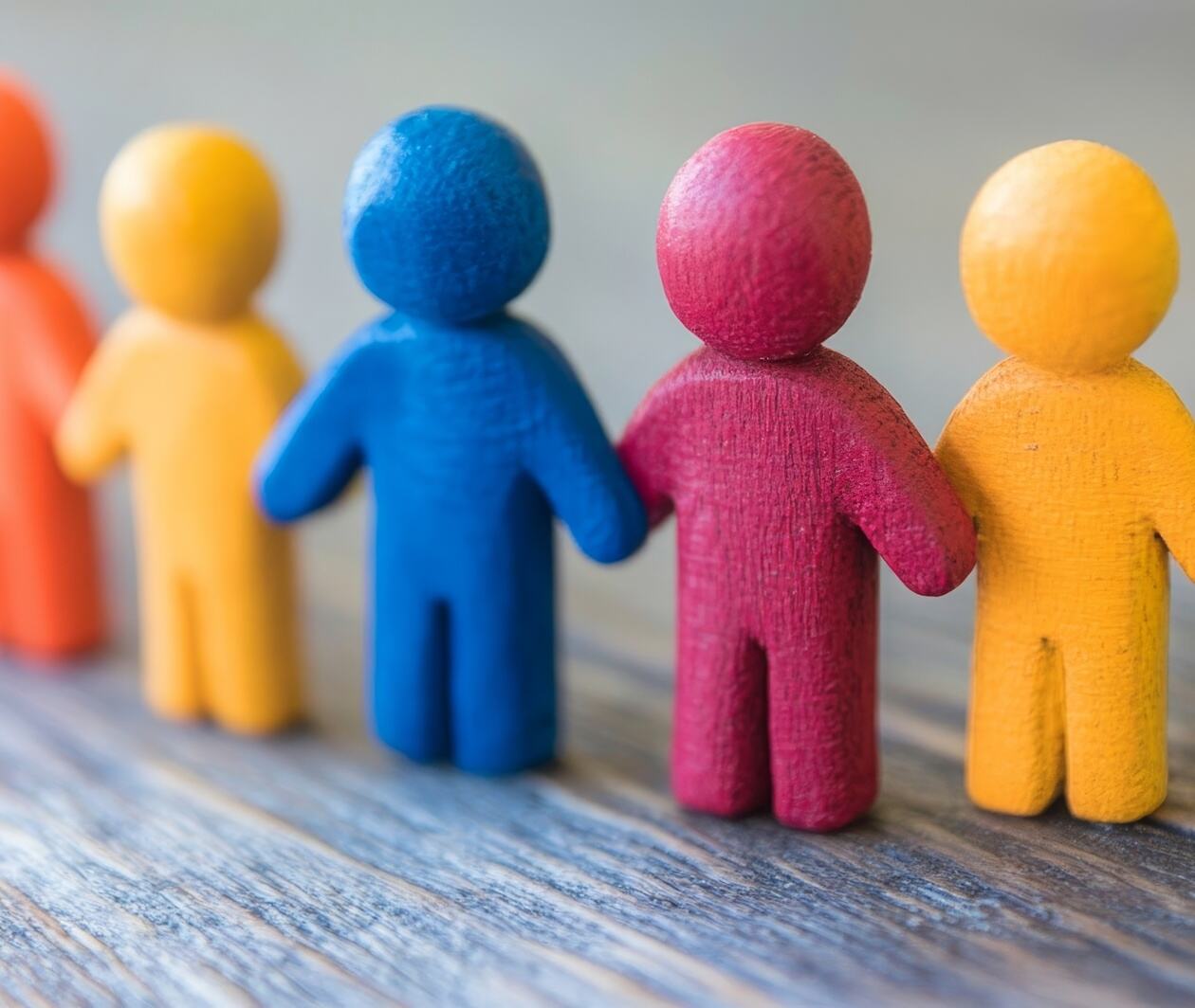 colourful representations of people in a line