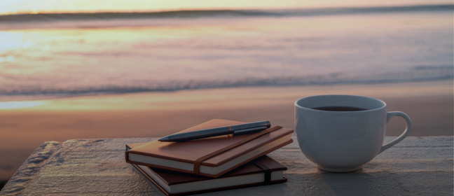 A cup of coffee on the beach