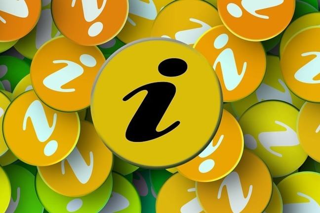 Brightly coloured badges with an 'i' for Information printed on them