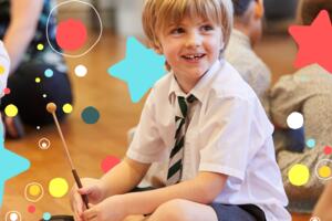 Child in classroom making music with Classroom 200