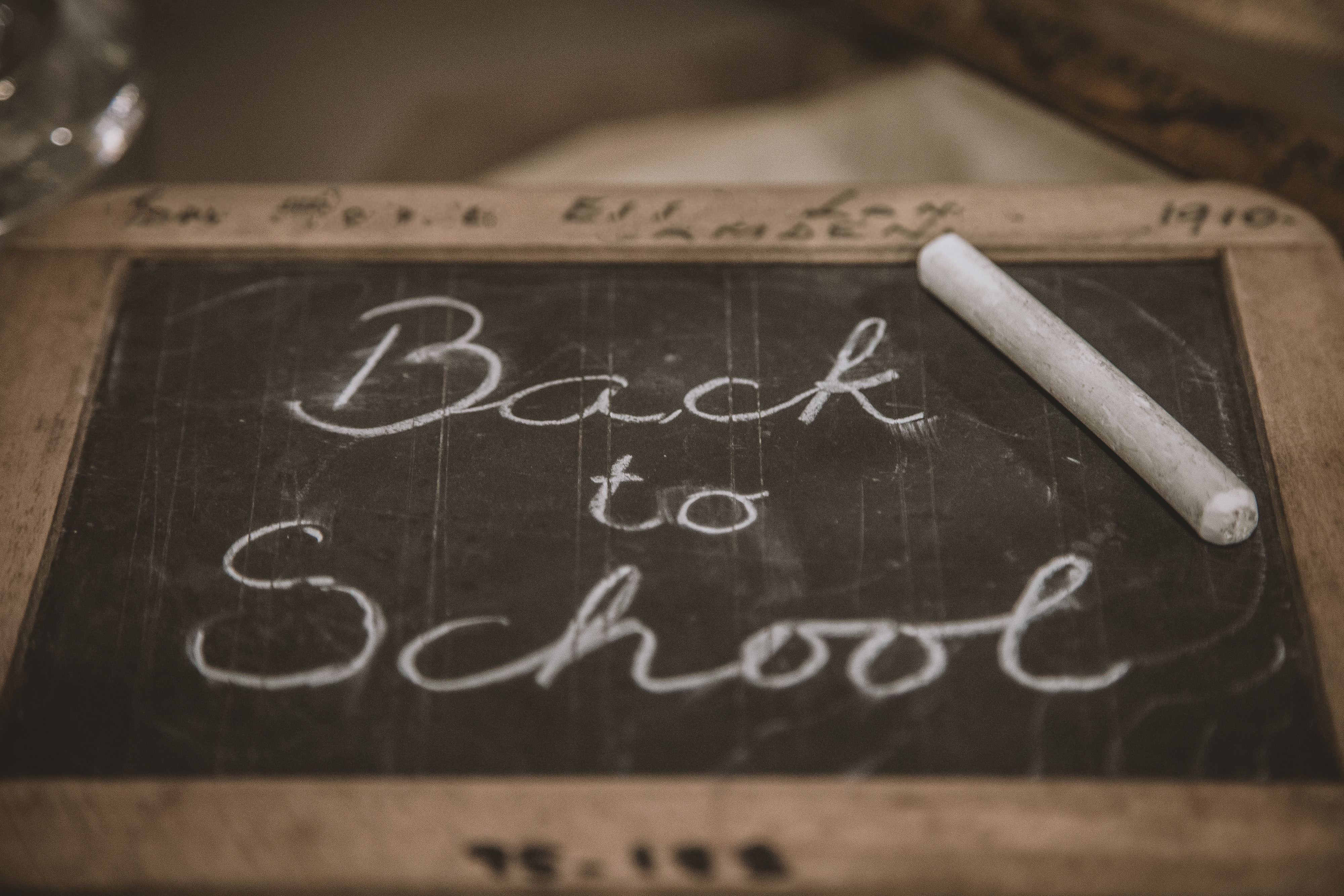 Back to school, written on a blackboard