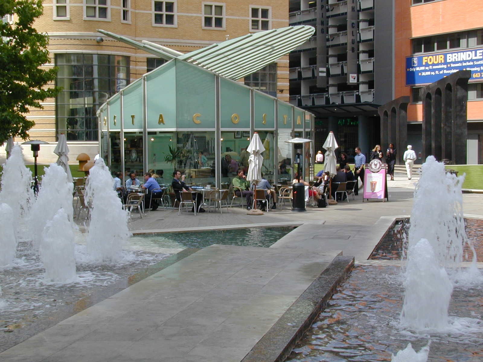 A public place with fountains and a café