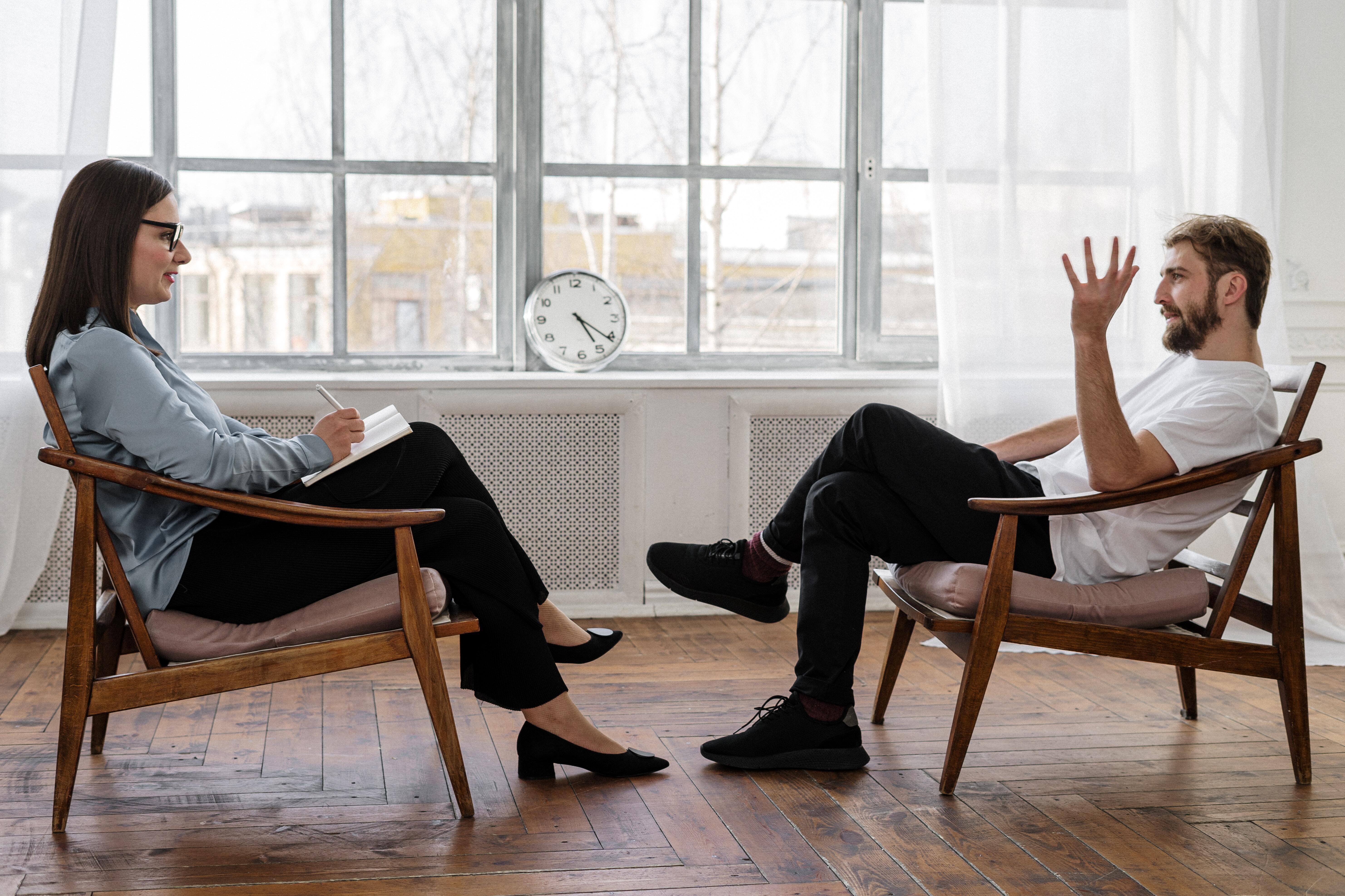 A man attending a therapy session.