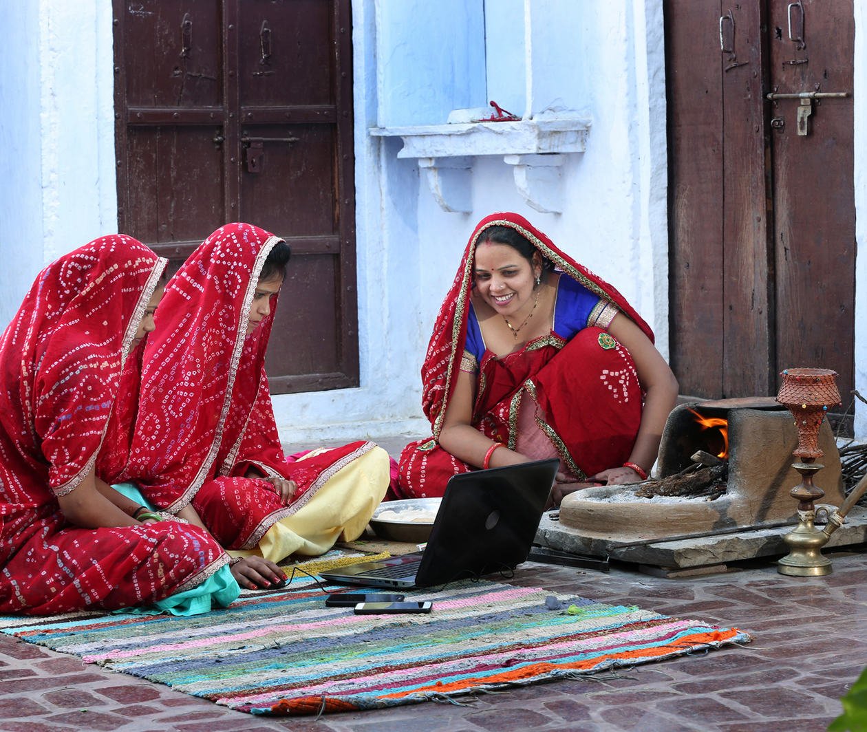 Group of Indian women using a laptop computer