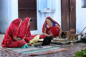 Group of Indian women using a laptop computer