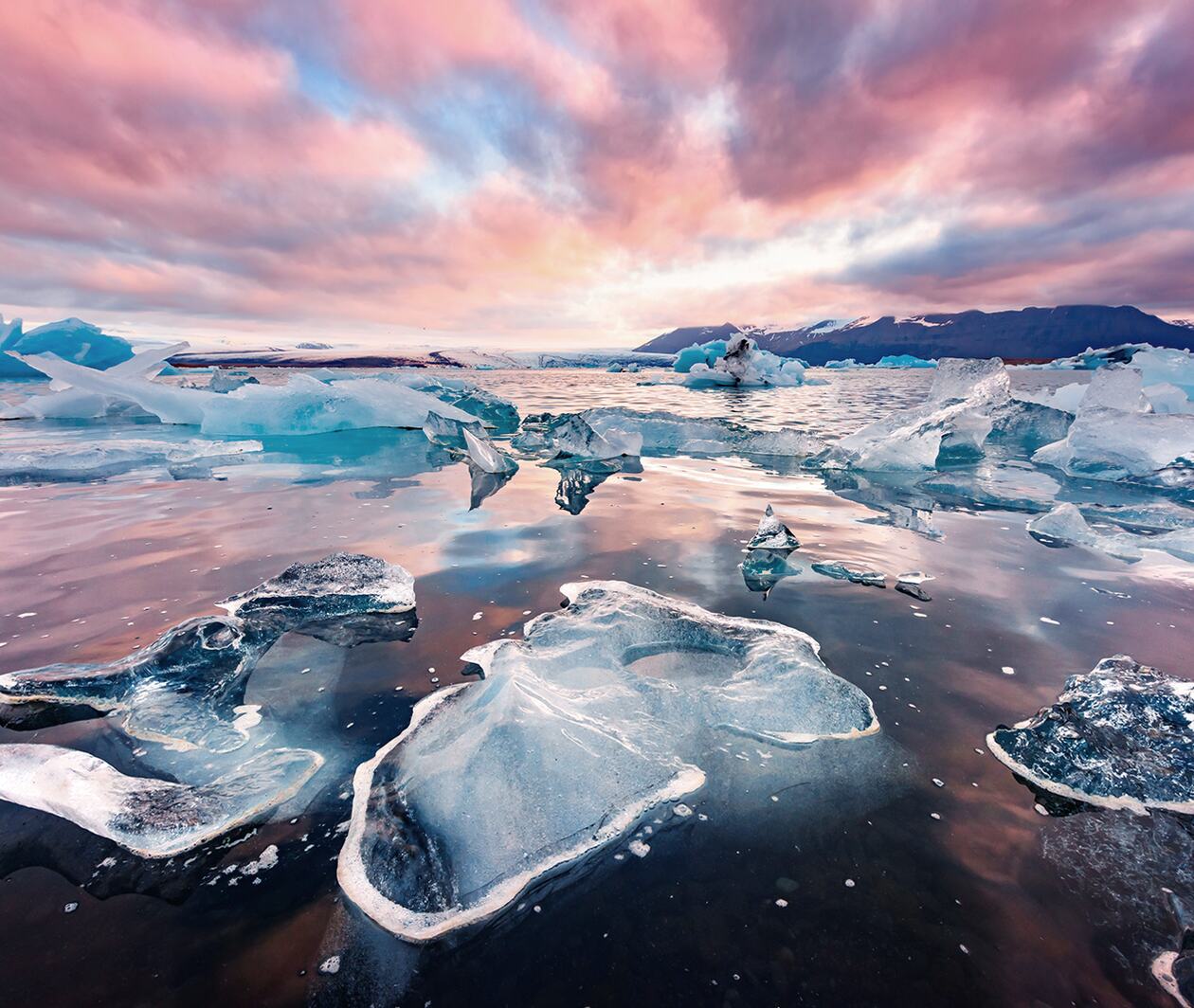 Icebergs with sunset skies