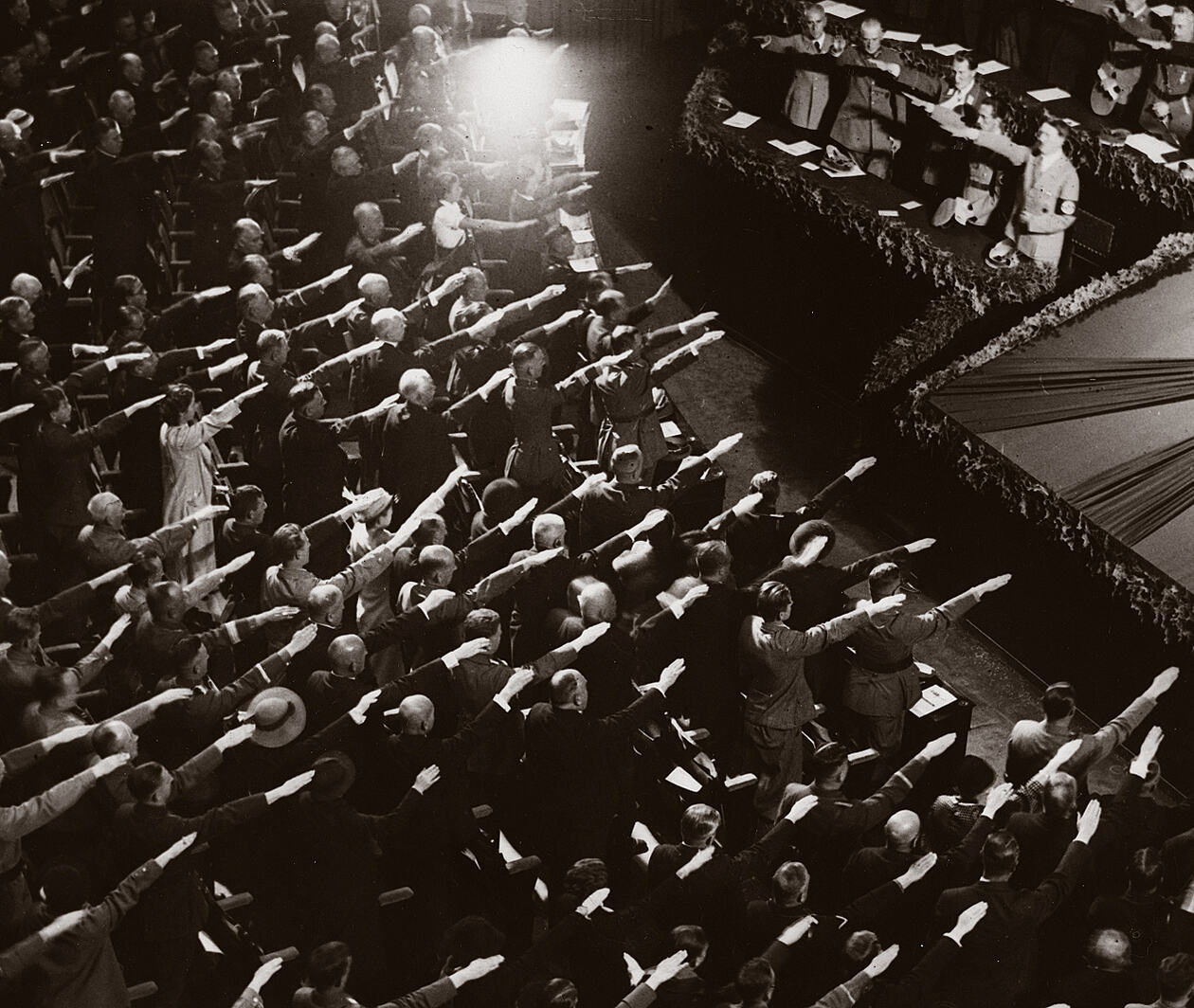 Audience performing Nazi salute