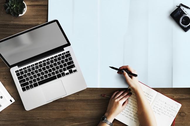 Laptop, pen, paper, pad