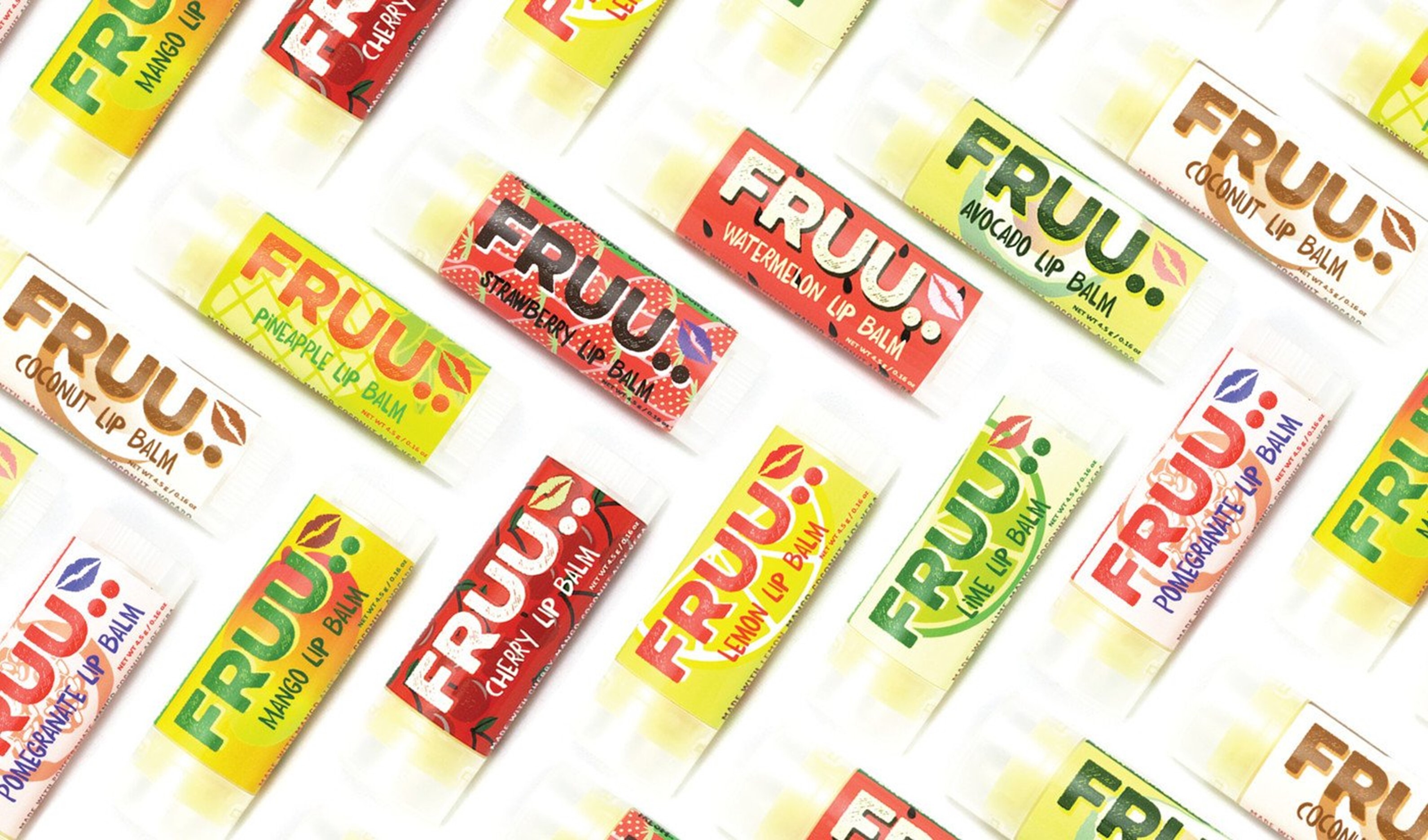 A selection of Fruu lipbalms in different coloured packaging against a white background