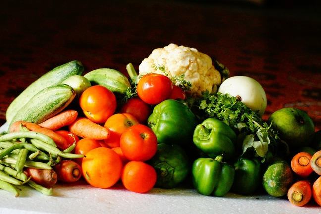 Fruit and vegetables sitting on a table