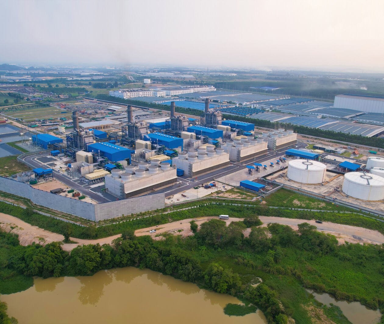 Aerial View of new Power Plant Cogeneration type supply electricity and stream to Industrial Estate with the concept of circularity and sustainability in industrial ecosystem.