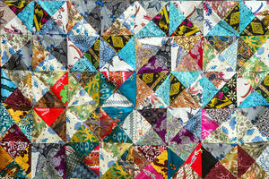Quilt with distinct colour and abstract patterns