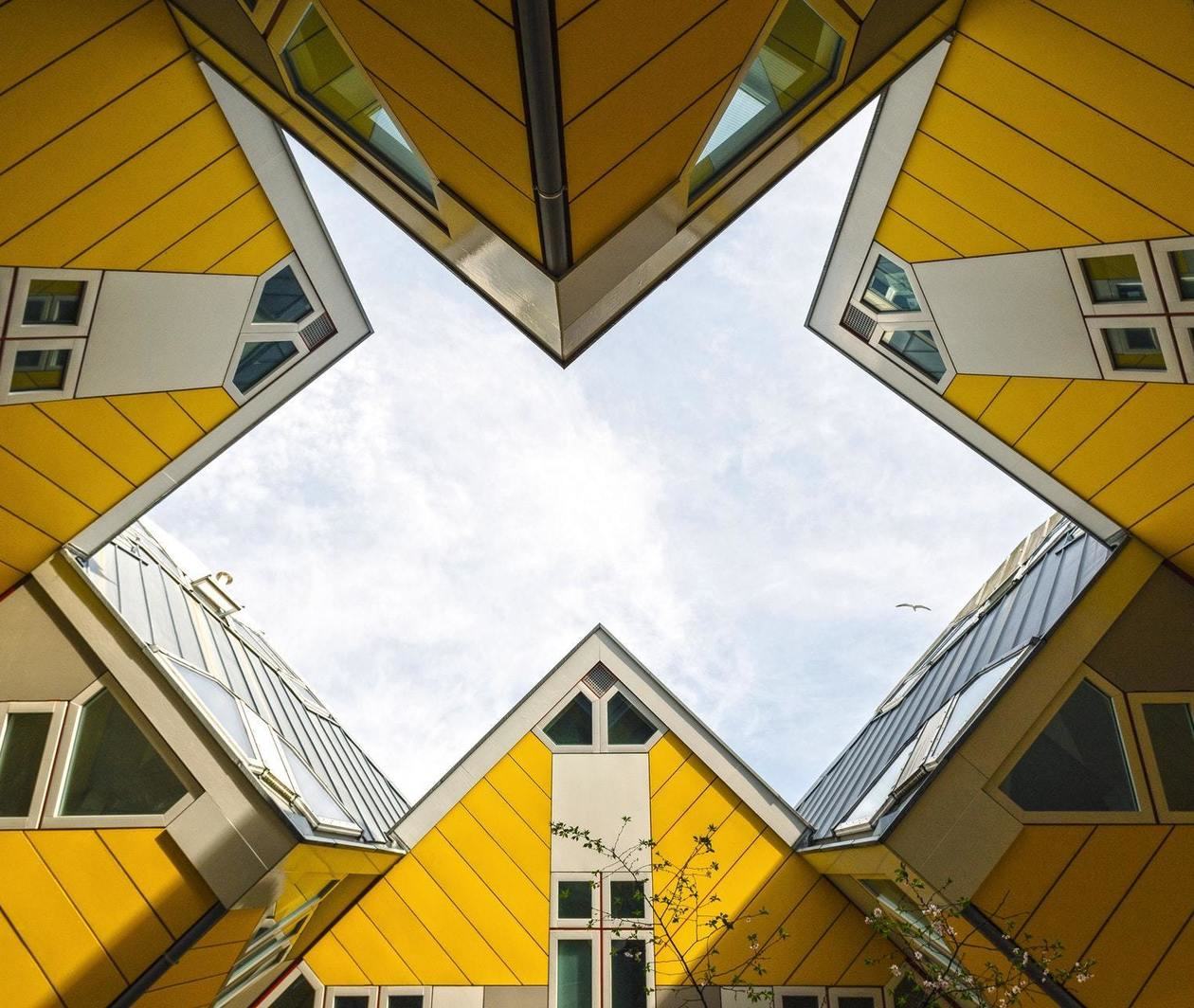 Low angle of yellow houses. Photo by Stas Knop from Pexels.