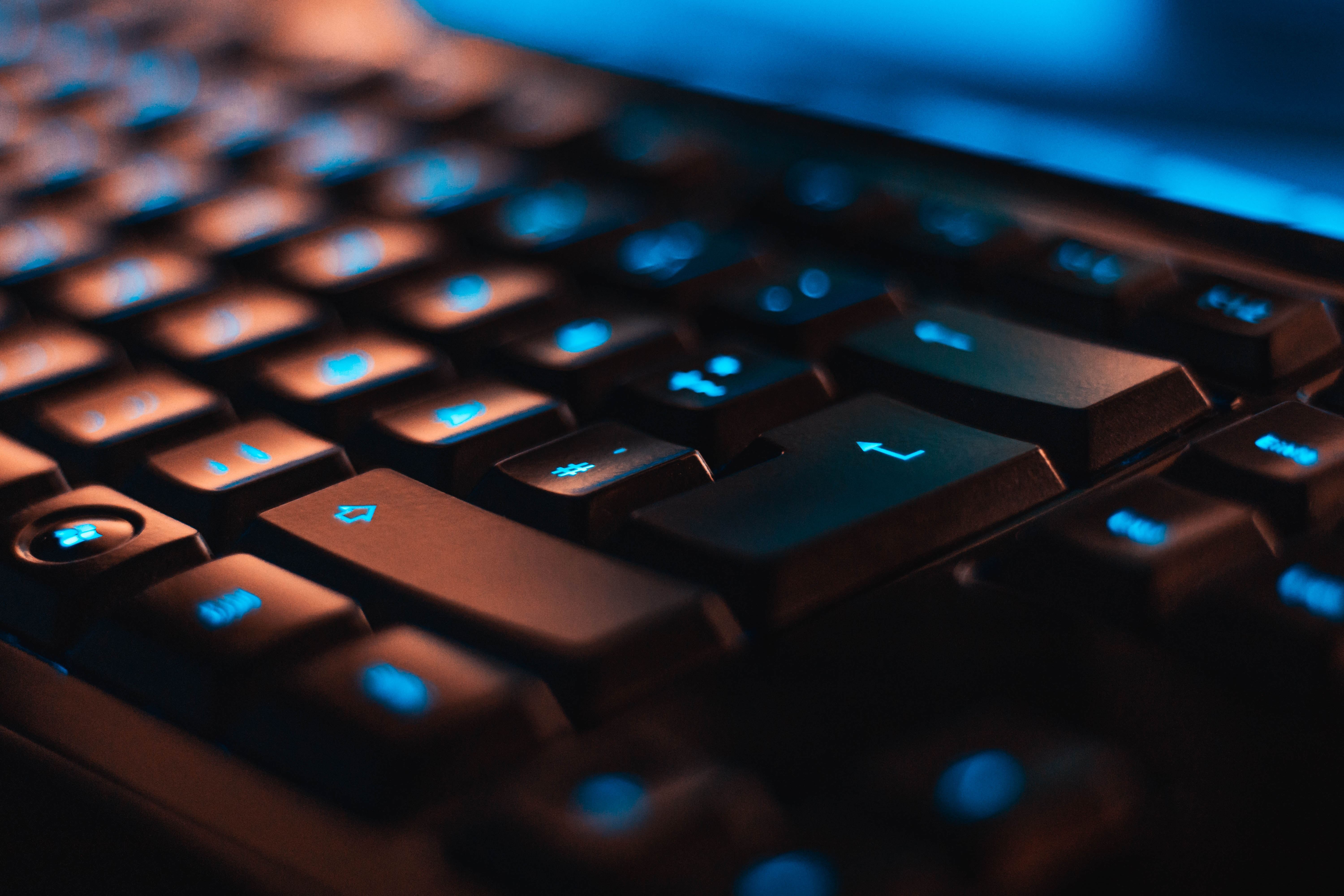 Keyboard with blue LED lights behind the keys