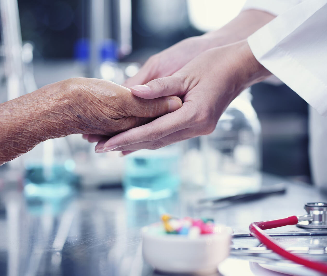 Photo taking care of the elderly people, doctor comforting patient