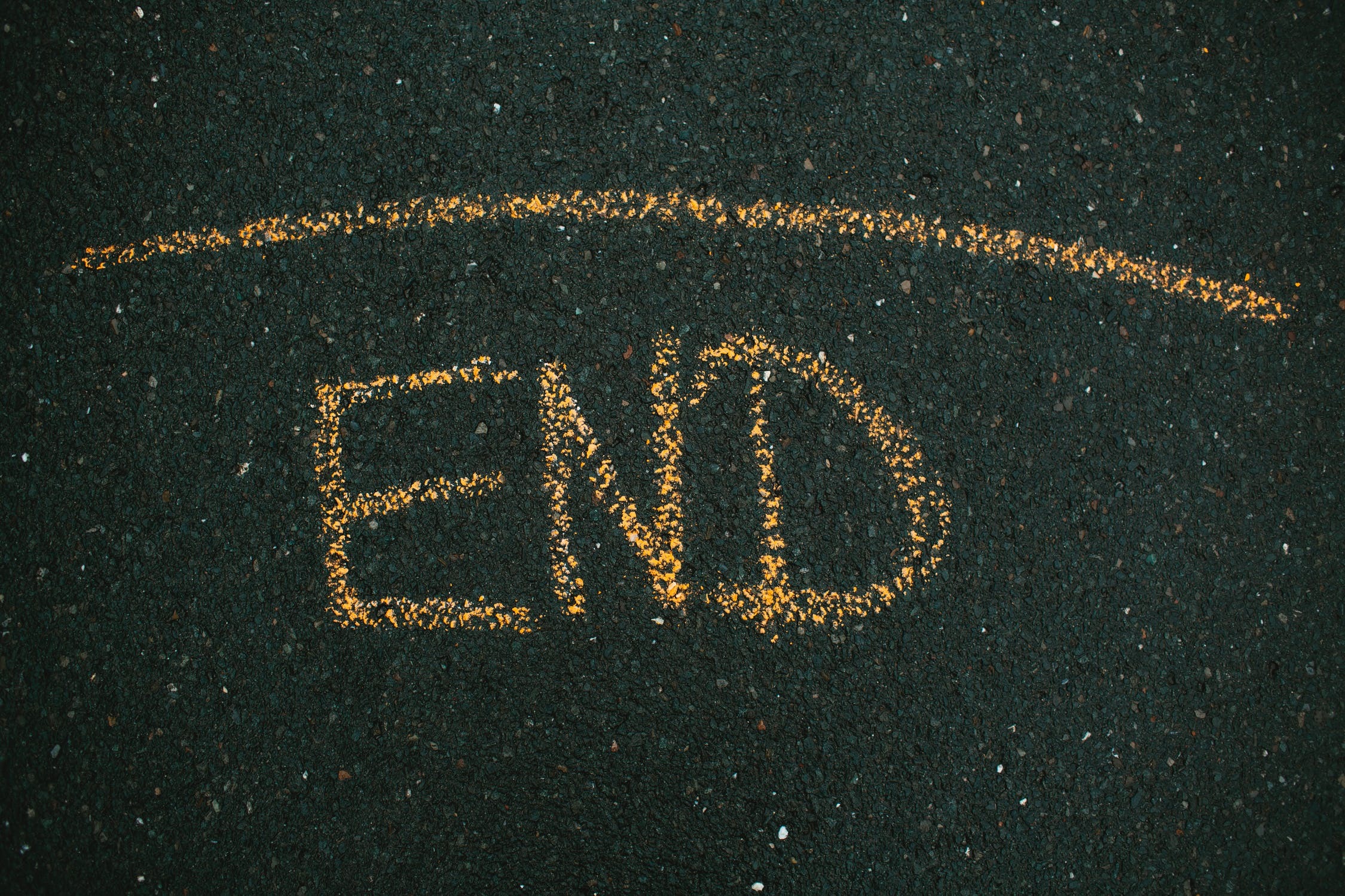 End written in chalk on the pavement