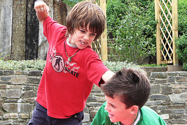 Two boys fighting