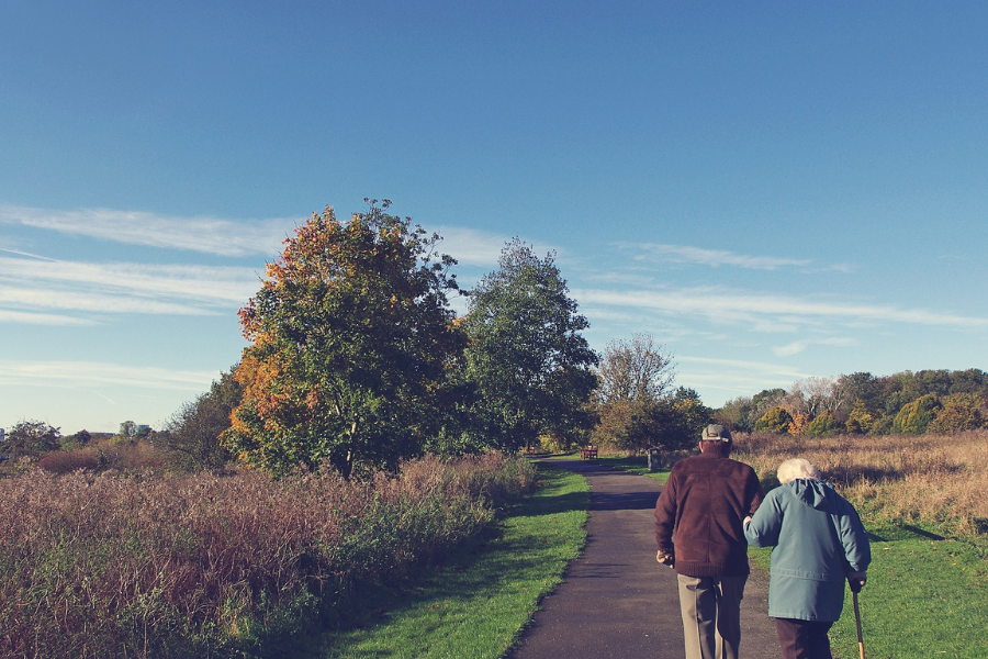 2 older adults walk