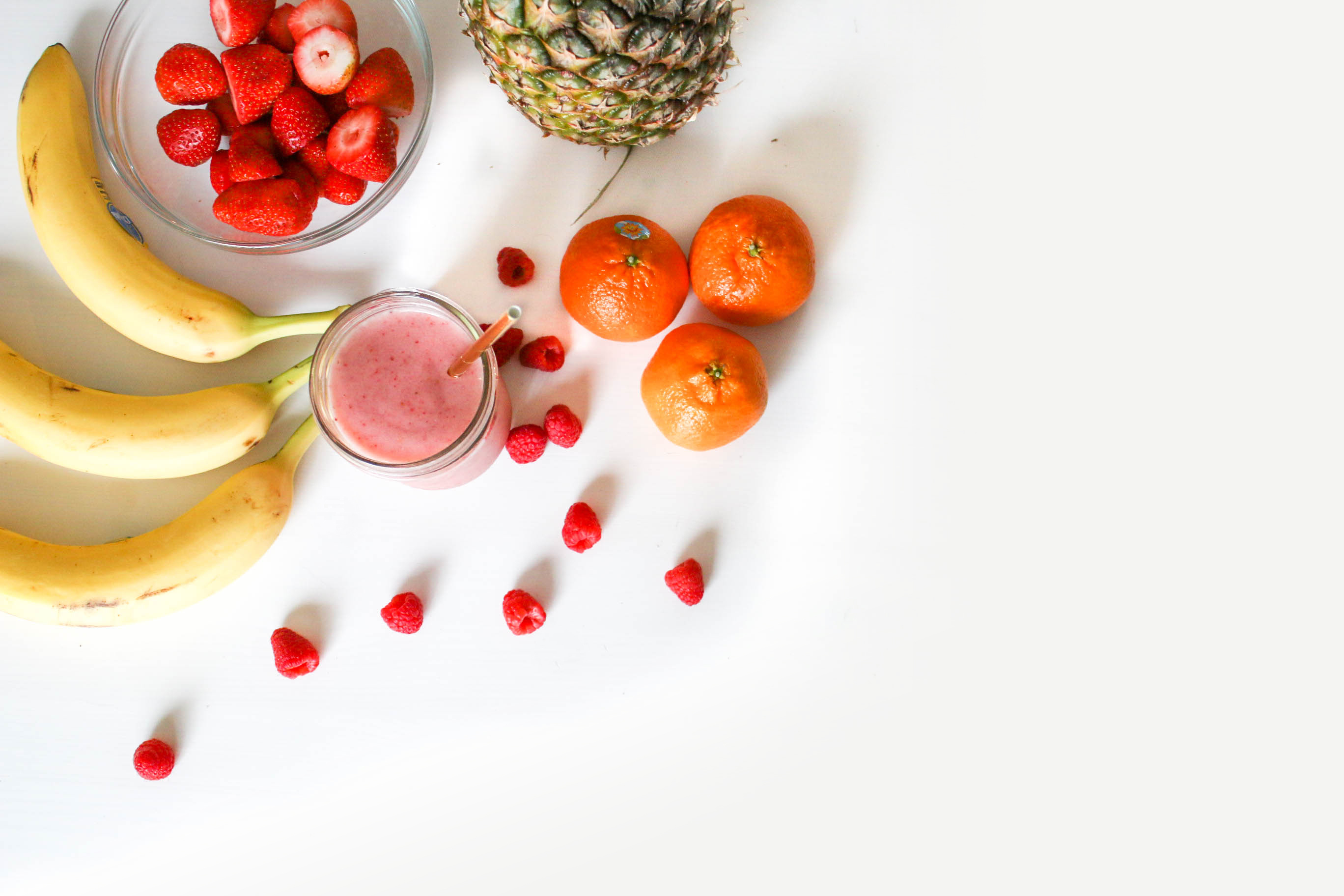 Assorted fruits on white surface