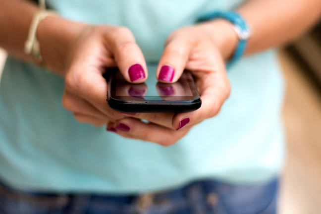 Woman using smartphone.