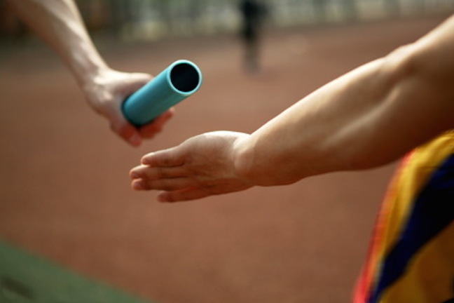 Image shows baton transfer to represent an intervention
