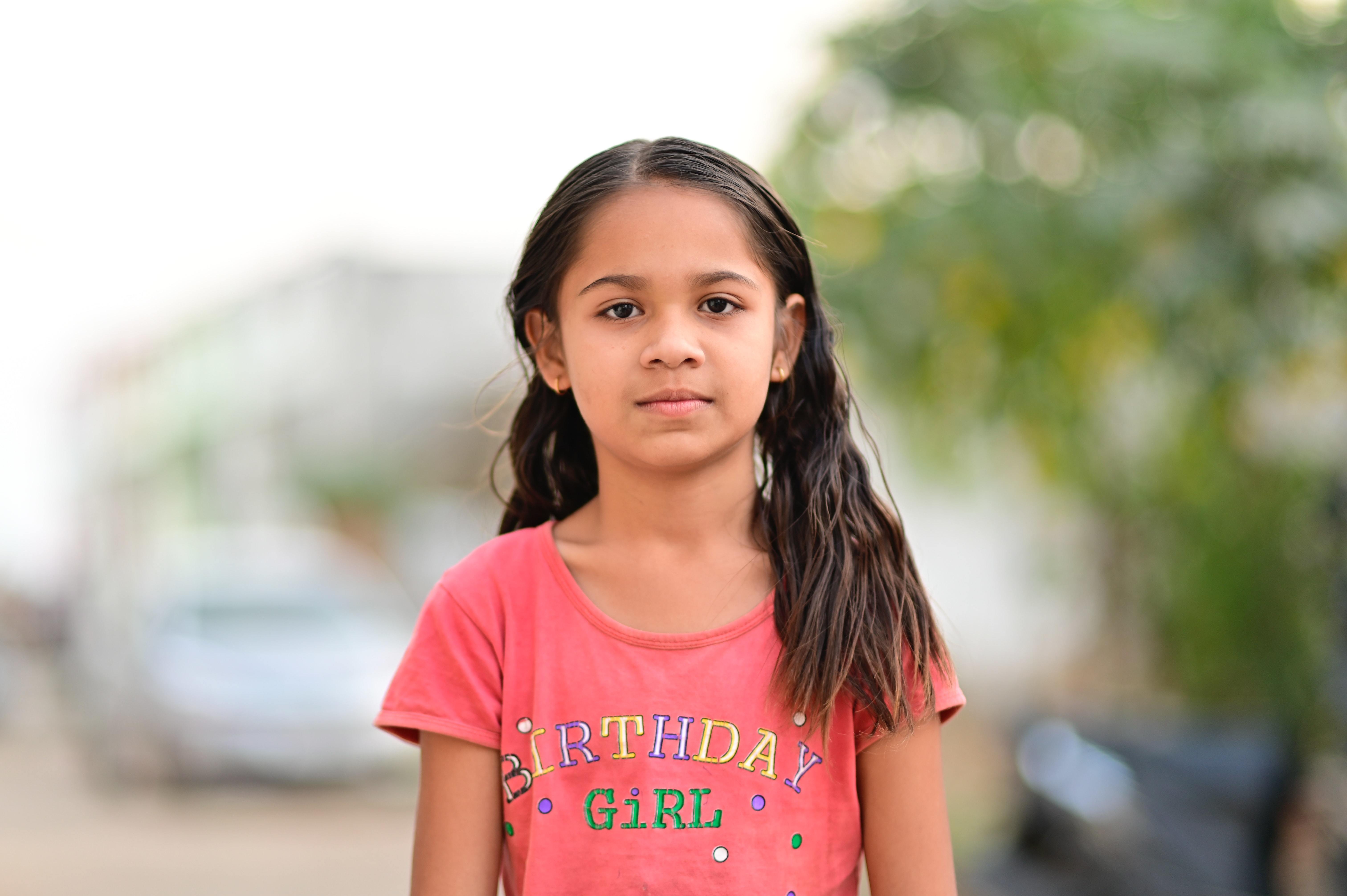 Young girl in birthday t-shirt