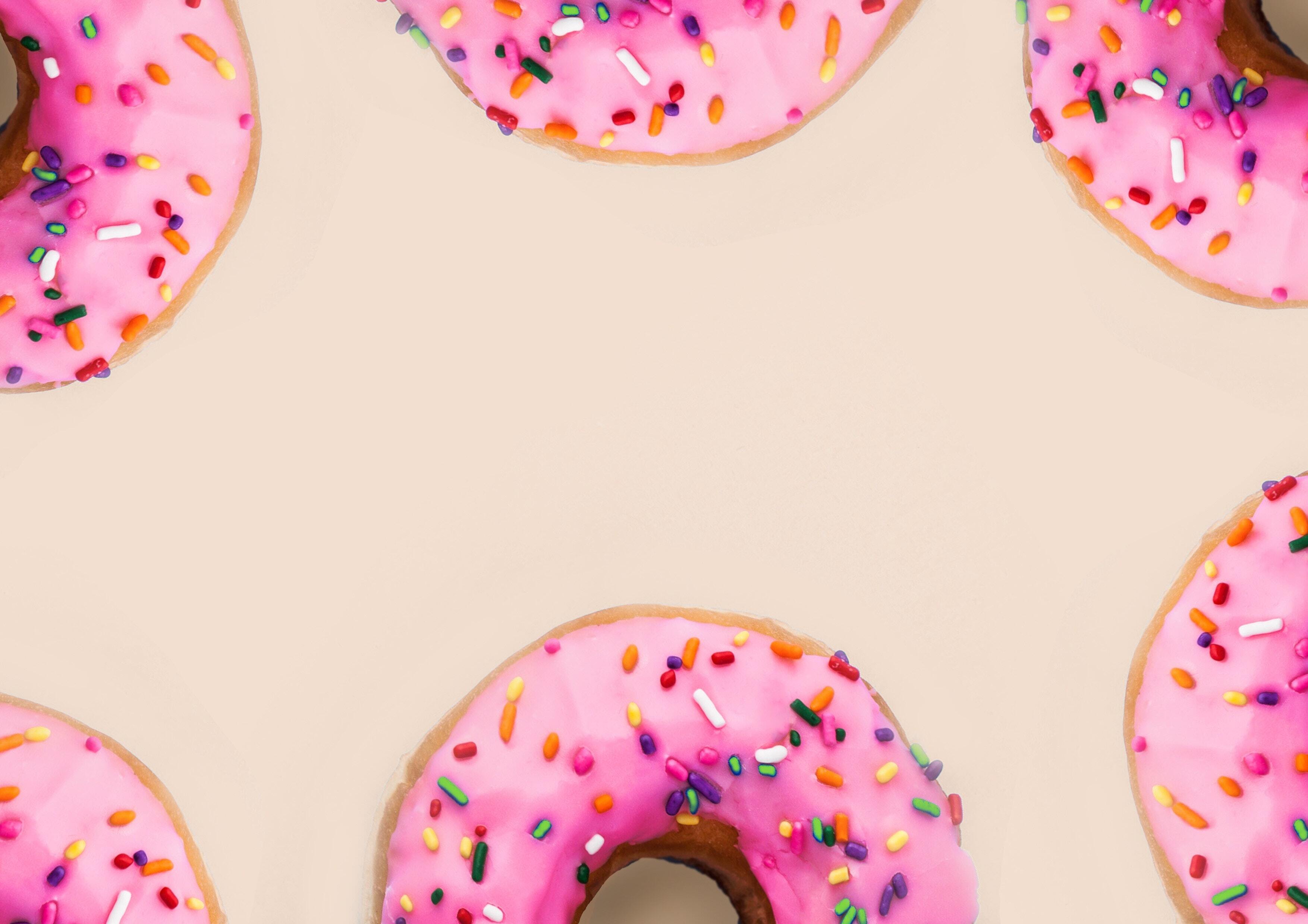 Pink donuts with rainbow sprinkles