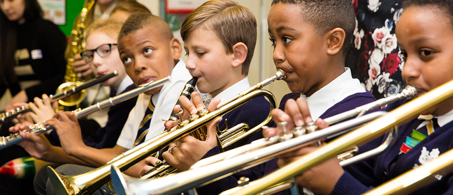 Students playing musical instruments