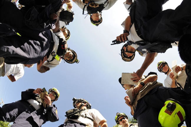 Image of search and rescue workers with equipment