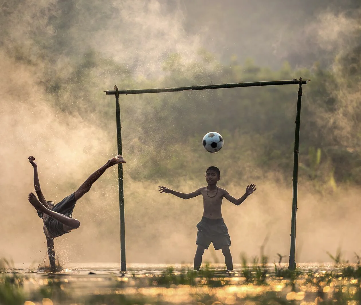 Children playing football