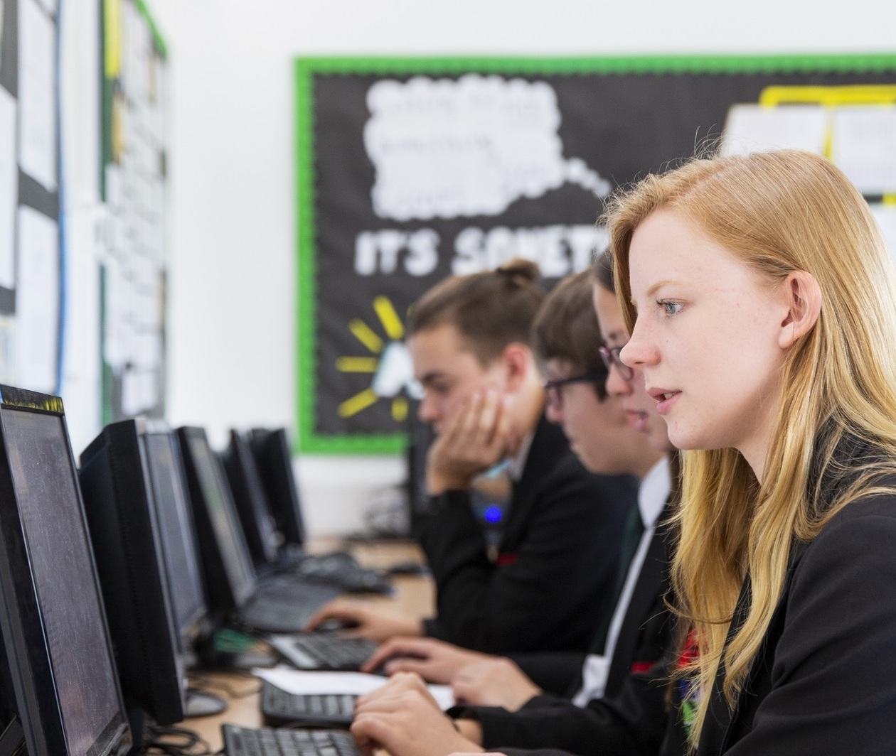 A set of GCSE students working at computers