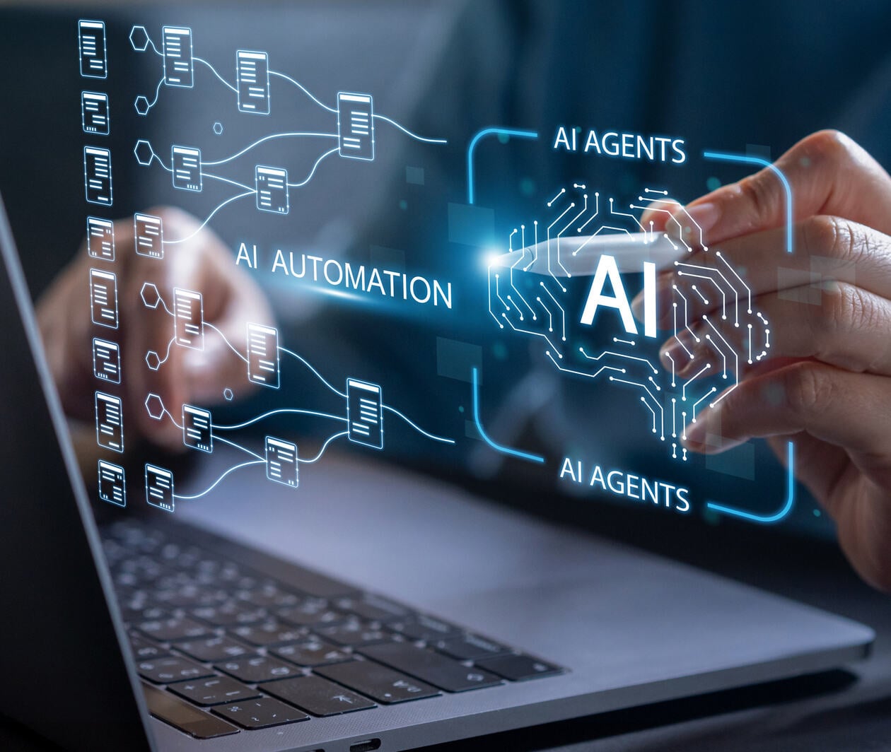 AI hologram with person at computer using a pen to draw the hologram