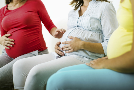 pregnant woman with cup of tea (istock)