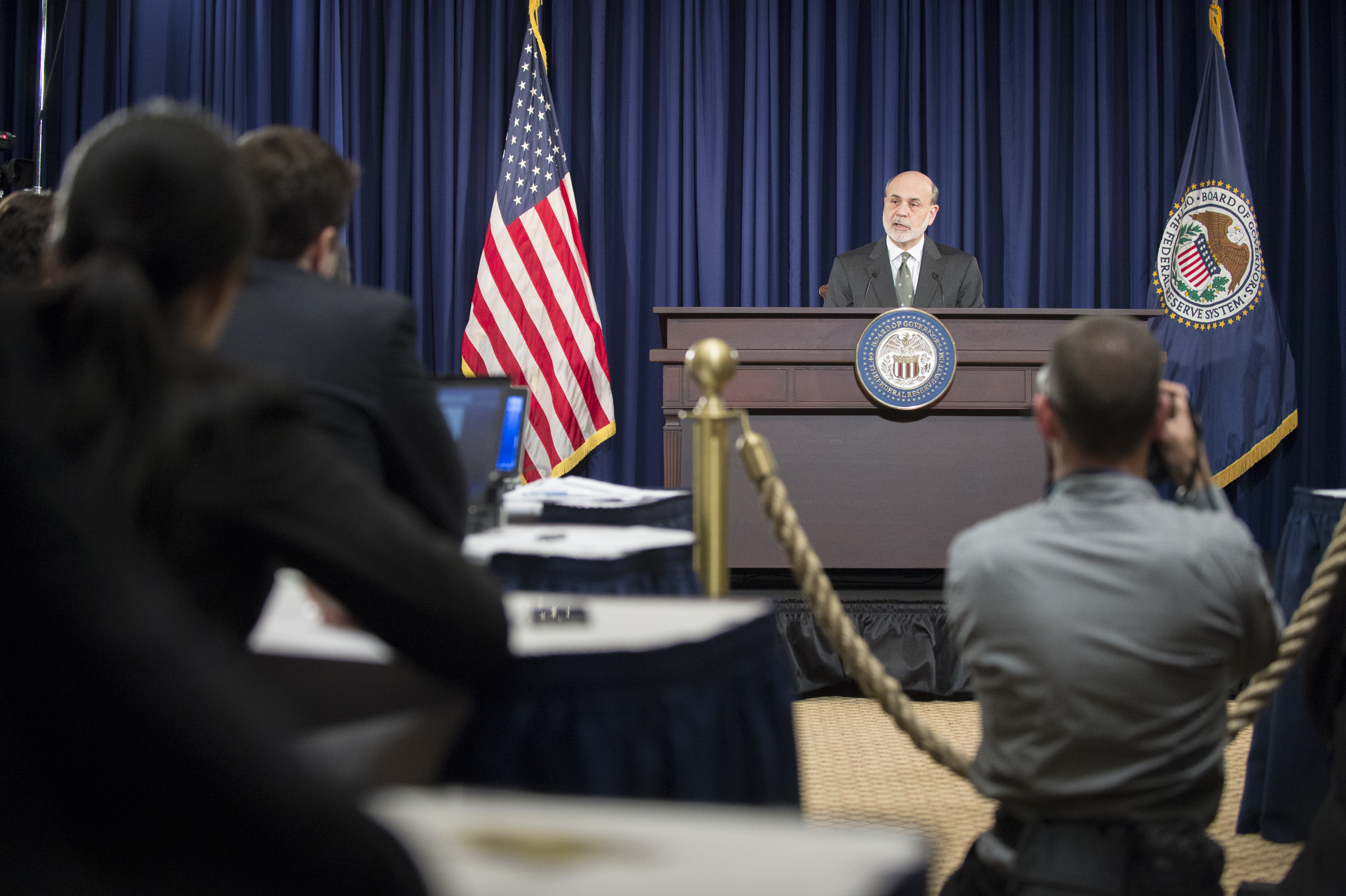 Chairman Ben S. Bernanke takes a reporter's question at a press conference on December 12, 2012.