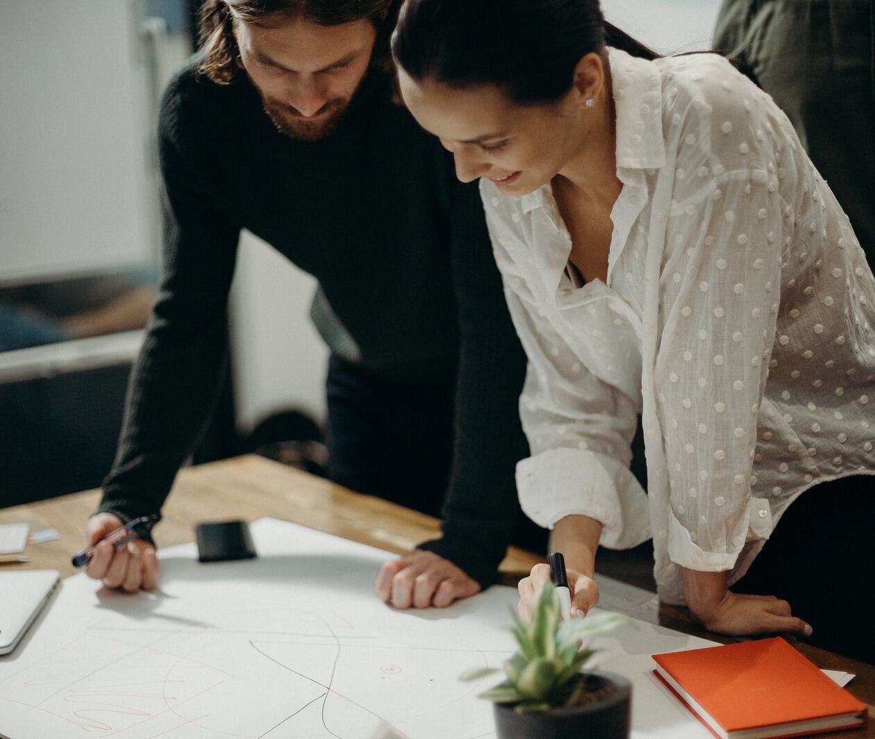 Two people working together on a project.