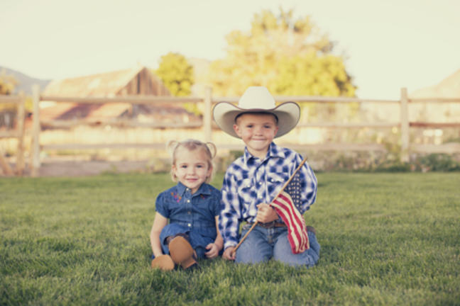 brother sister with American flag