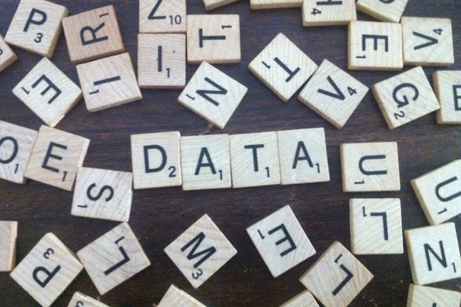 Scrabble tiles spelling the word "data".