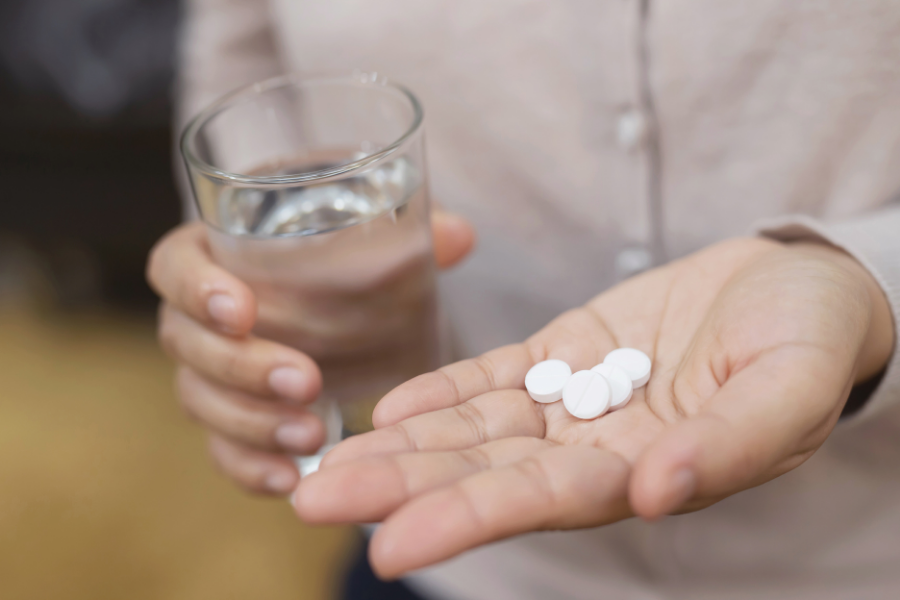 a person taking medication