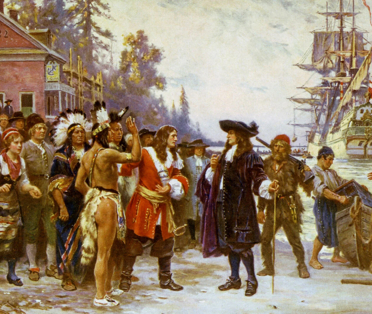 Native American Chieftains greeting a European settler on the beachfront