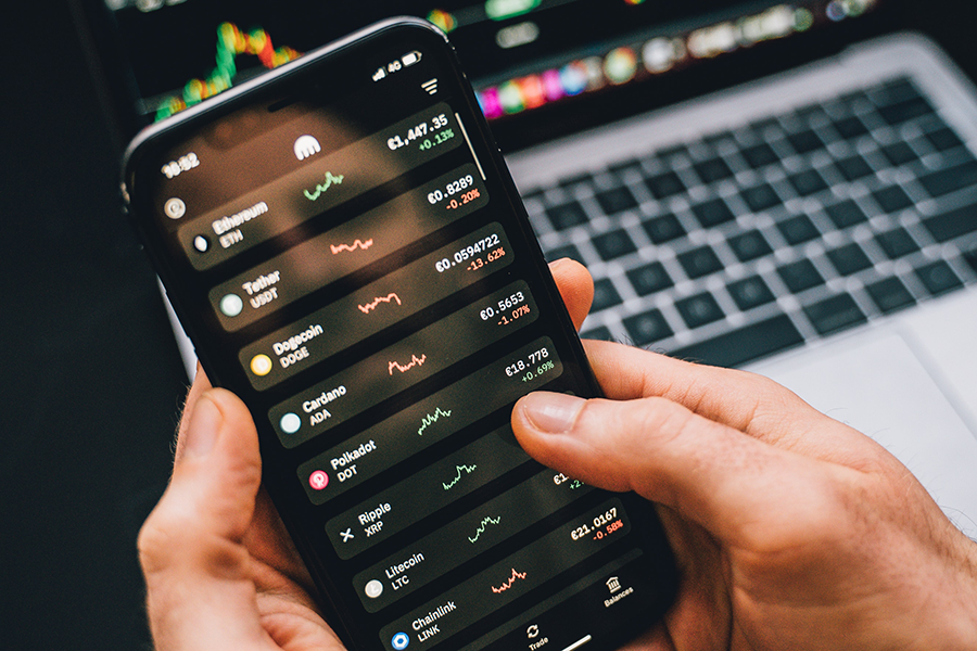 Phone showing valuation of cryptocurrencies