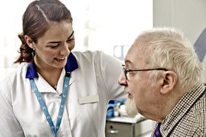 A patient and a nurse interacting