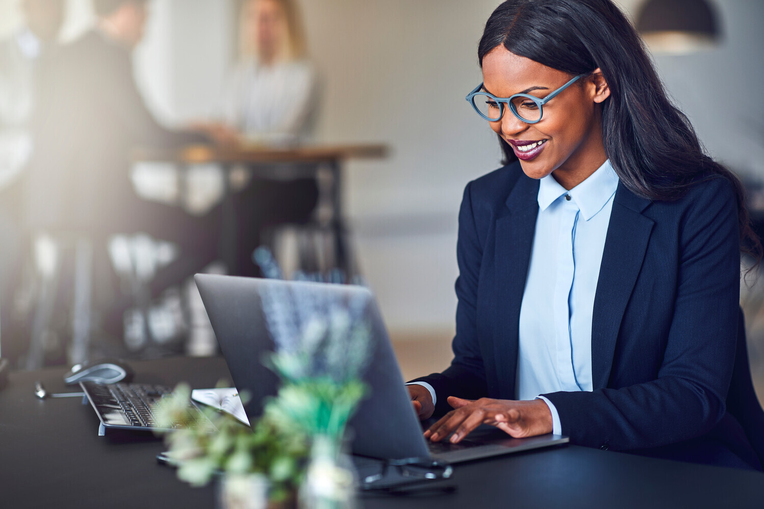 Image of a solicitor on a laptop