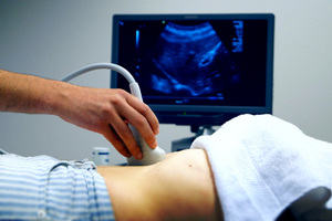Photograph of an ultrasound scan taking place