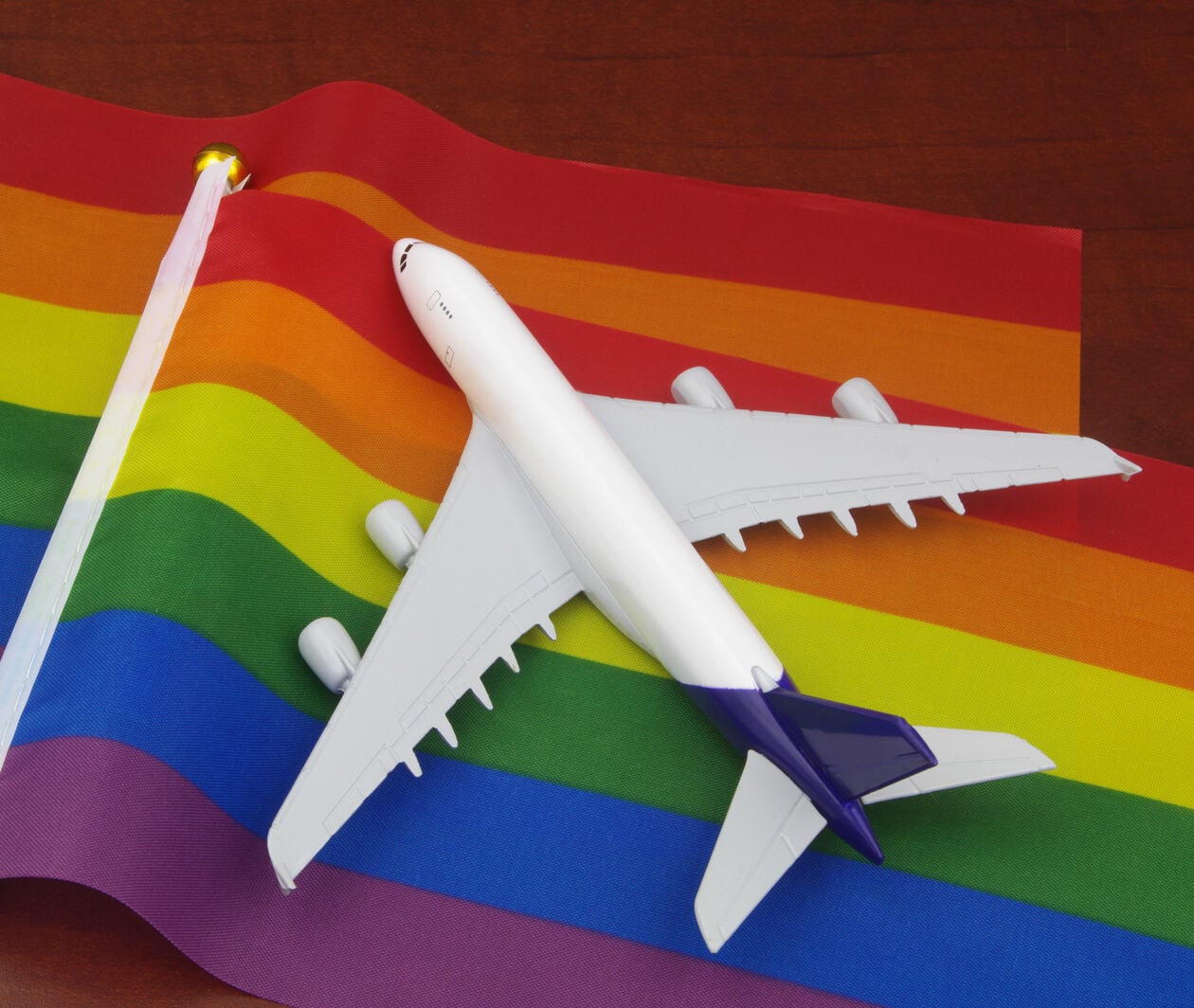 Airplane model on LGBT pride flags