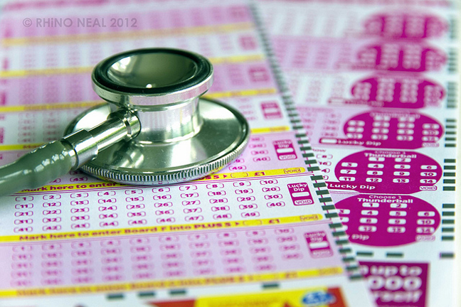 Picture of health lottery ticket with stethoscope